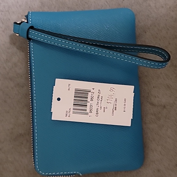 Coach Handbags - Crossgrain leather Corner Zip wristlet